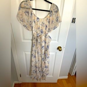 Local boutique purchase. Beautiful floral dress.